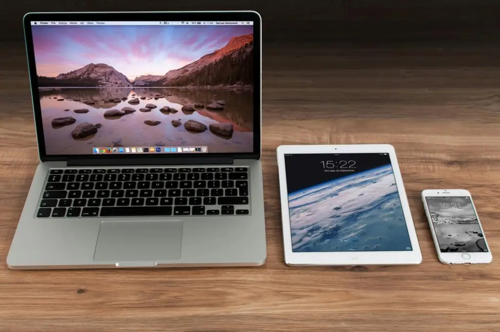 A laptop, tablet, and mobile device